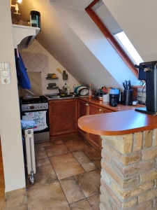 Szekszárd Kossuth L. utcai tetőtéri lakás 13